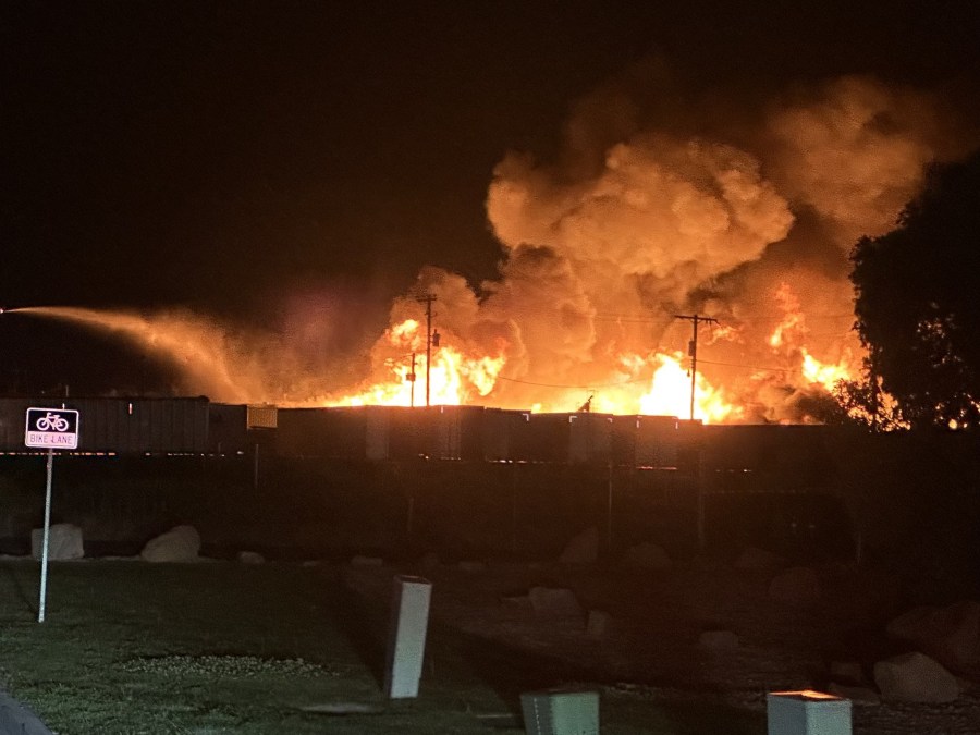 A fire burns at a business near 3000 West and 900 South in Salt Lake City (Courtesy: SLC FIre Department)