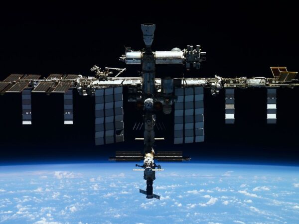 Defunct Russian satellite breaks apart forcing ISS astronauts to react