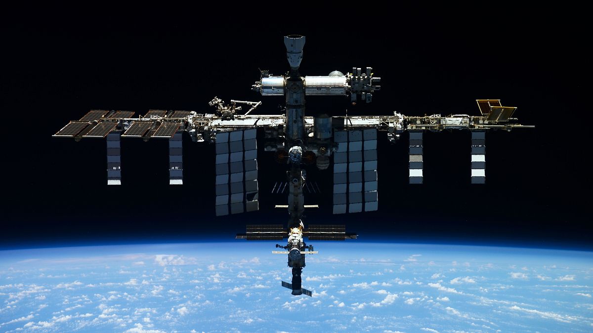 Defunct Russian satellite breaks apart forcing ISS astronauts to react