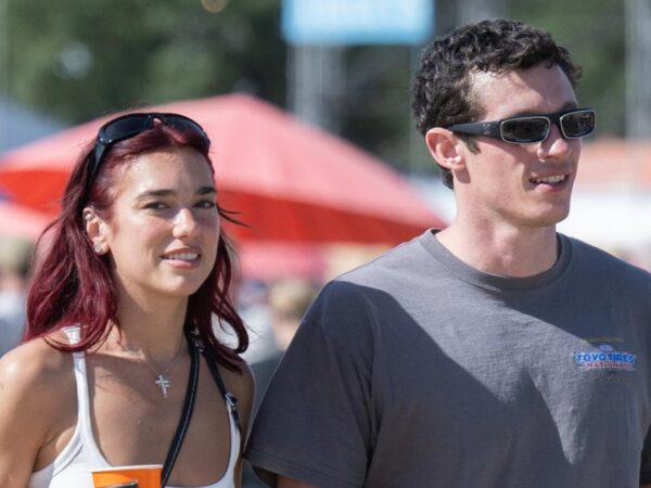 Dua Lipa and Callum Turner Hold Hands During Glastonbury Festival