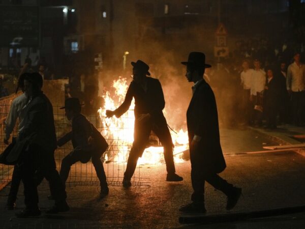 Ultra-Orthodox protest against order to enlist in Israeli military turns violent in Jerusalem