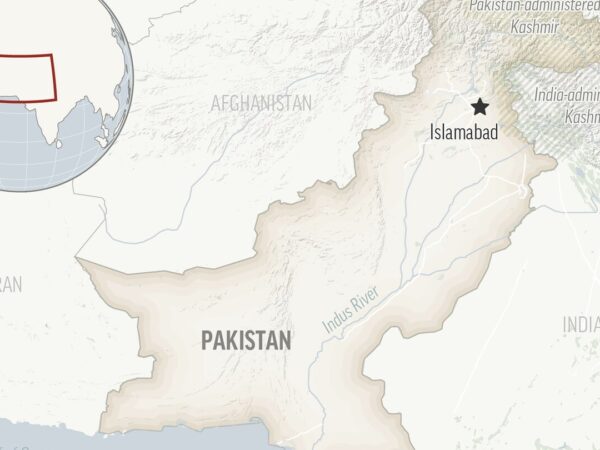 A roadside bomb planted on a bridge hits a rickshaw in Pakistan, killing 2 people and wounding 8