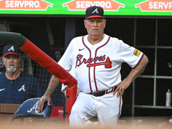 Braves manager Brian Snitker OK after taking Ozzie Albies foul ball to the groin