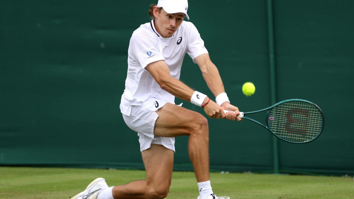 De Minaur slays Wimbledon demon but incident on match point puts fitness in doubt