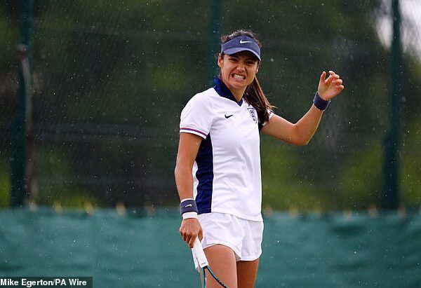 Emma Raducanu wears an England football kit while training at Wimbledon today