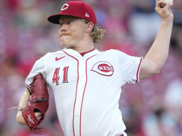 Hinds homers in big league debut and Abbott goes 7 innings as Reds blank Rockies 6-0