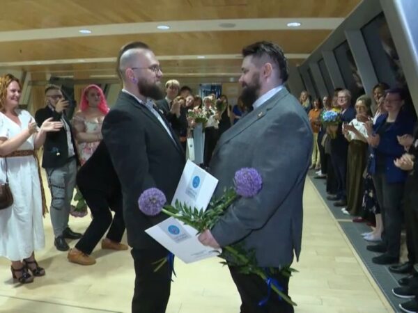 Latvian couple make history with first same-sex partnership registration under new law