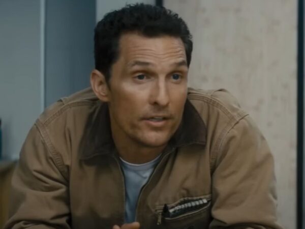 Matthew McConaughey leaning against a table and talking in Interstellar.