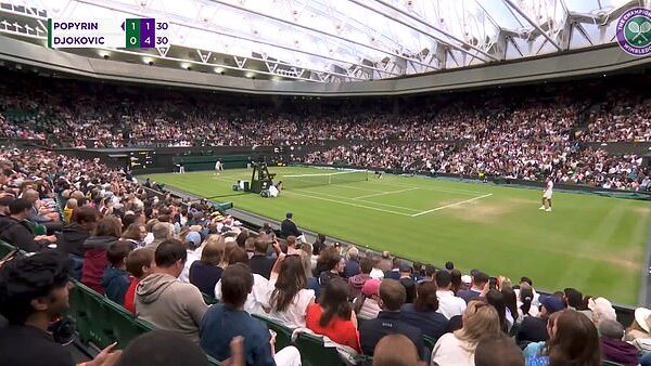 Novak Djokovic's match at Wimbledon comes to a halt as fans celebrate England's penalty shoot-out victory against Switzerland on Centre Court - as world No 2 sees the funny side