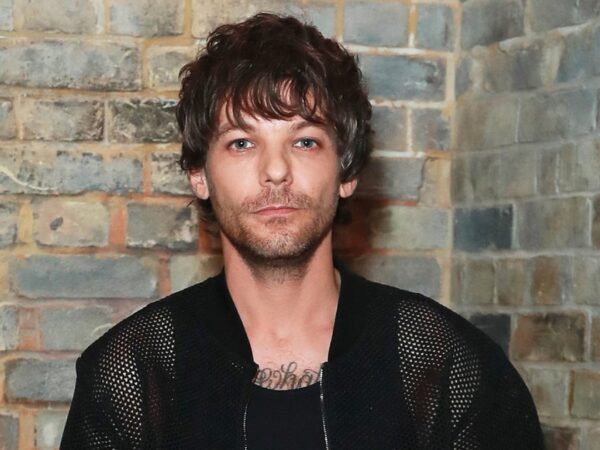 One Direction’s Louis Tomlinson Brought a TV to Glastonbury to Watch a Soccer Match