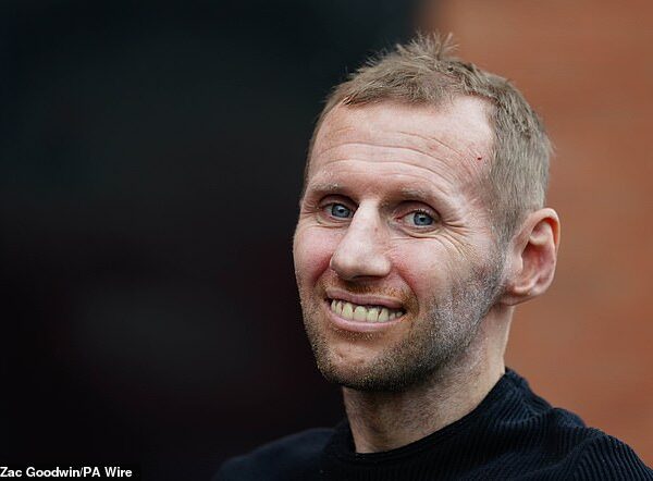 Hundreds of mourners have lined the streets today to pay respect to Rugby League legend and motor neurone disease sufferer Rob Burrow