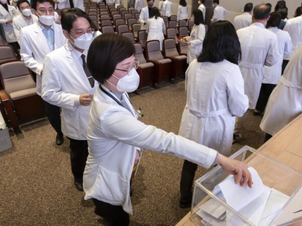 South Korea doctors worry a plan to boost their ranks will reduce pay