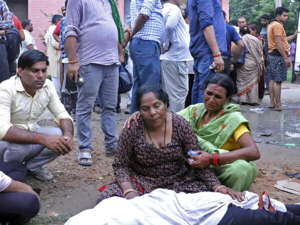 Stampede at religious gathering in India leaves at least 77 people dead