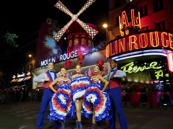 The Moulin Rouge cabaret in Paris has its windmill back, after a stunning collapse