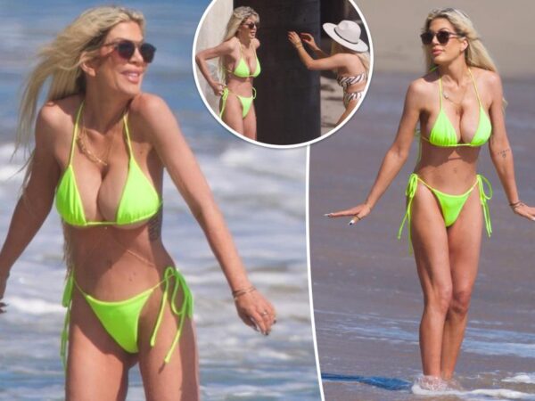 Tori Spelling shows off figure in neon green bikini