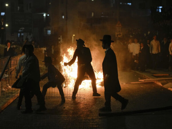 Ultra-Orthodox protest against order to enlist in Israeli military turns violent in Jerusalem